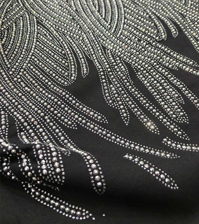 Rhinestone embellishments on custom clothing